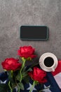 Concept of Independence day or Memorial day with smart phone and coffee. Flag over dark gray table background