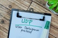 Concept of UDP - User Datagram Protocol write on paperwork isolated on Wooden Table
