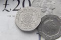 Pounds quids on the wooden background