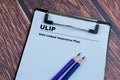 Concept of ULIP - Unit Linked Insurance Plan write on paperwork isolated on wooden background