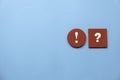 Concept of uncertainty, urgency, importance, inquiry, faq, questions and answers. Exclamation mark and question mark symbol on red