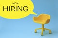 Concept of vacant chair. Yellow stool on blue clean background. Photo in minimal style