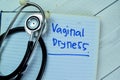 Concept of Vaginal Dryness write on book with stethoscope isolated on Wooden Table