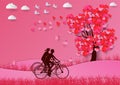 Concept of valentine day ,with a heart shaped tree and lovers ride bicycle paper art and craft style Royalty Free Stock Photo