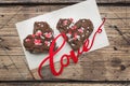 Concept Valentine`s Day. Chocolate chip cookies on a wooden table. Greeting card. Copy space Royalty Free Stock Photo