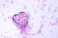 concept of valentine's day, mother's day, wedding, delicate pink background of small hearts in metal shape