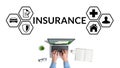 The concept of various types of insurance as a business. Insurance agent working on laptop. Royalty Free Stock Photo