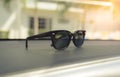 Concept vintage of sunglasses on the console car. Royalty Free Stock Photo
