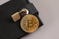 Concept Of Virtual Wallet And Bitcoins. Gold bitcoin and padlock. Crypto Wallet