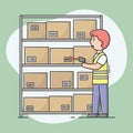 Concept Of Warehouse. Storehouse Cheerful Worker In Uniform Scan Parcels By Barcode Scanner. Warehouse With Cardboard