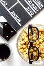 Concept of watching movies with popcorn top view white background Royalty Free Stock Photo