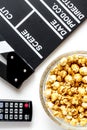 Concept of watching movies with popcorn top view white background Royalty Free Stock Photo