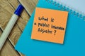 Concept of What is a Public Insurance Adjuster? write on sticky notes isolated on Wooden Table