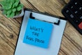 Concept of What\'s The Real Price write on sticky notes isolated on Wooden Table Royalty Free Stock Photo