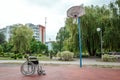 The concept of a wheelchair on the sports ground, a disabled person, a fulfilling life, paralyzed. Wheelchair on the basketball