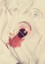 Concept, Wine glass, spilled, on a white shirt, no people, horizontal, top view, Royalty Free Stock Photo