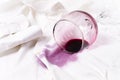 Concept, Wine glass, spilled, on a white shirt, no people, horizontal, top view, Royalty Free Stock Photo