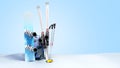 concept of winter tourism snowboarding and skiing in the snow 3d render on blue