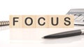 The concept word FOCUS is assembled from cubes. Search for words and information concept Royalty Free Stock Photo