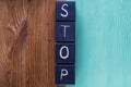 Concept of word Stop, contradistinction or versus. Royalty Free Stock Photo