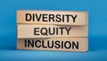 Concept words \'Diversity equity inclusion\' on wooden blocks.