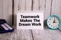 Concept words TMDW Teamwork makes dream work on white note on beautiful wooden background Royalty Free Stock Photo