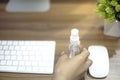 Work from home and hand sanitiser bottle
