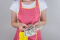Concept of working hard. Cropped close up photo of satisfied happy smart girl holding stack of money isolated grey background Royalty Free Stock Photo