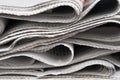 Newspapers piled up close-up background Royalty Free Stock Photo