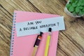 Concept of Are You A Reliable Narrator? write on sticky notes isolated on Wooden Table