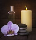 The concept of Zen and relaxation.Spa still life with a burning candle on a wooden background Royalty Free Stock Photo