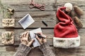 Conception: Christmas. Making Christmas gifts. A man writes a letter Greeting cards to family and friends Royalty Free Stock Photo