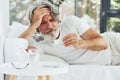 Conception of illness and virus. Senior stylish modern man with grey hair and beard indoors Royalty Free Stock Photo