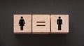 Concepts of gender equality. wooden cubes with female and male symbol and equal sign. Equal pay social concept