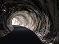 Conceptual abstract road tunnel with light at the end