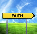 Conceptual arrow sign against beautiful landscape with text - FAITH