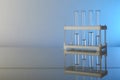 Conceptual background with chemical flasks. blue backdrop with lab glassware with copy space. Royalty Free Stock Photo