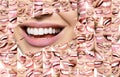Conceptual background makes of set of laughing human faces with great teeth and detail of young woman`s beautiful smile . Healthy