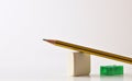 Conceptual background of teaching schools with pencil eraser and sharpener Royalty Free Stock Photo