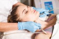 Conceptual beauty and cosmetology image of the hands of several beauticians holding their respective equipment. Beauty Royalty Free Stock Photo