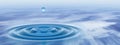 Blue liquid drop falling in water with ripples and waves banner Royalty Free Stock Photo