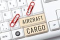 Conceptual caption Aircraft Cargo. Business concept Freight Carrier Airmail Transport goods through airplane