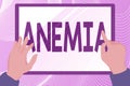 Text sign showing Anemia. Business overview condition where there deficiency of red cells of haemoglobin in blood Hands