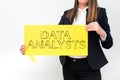 Conceptual display Data Analysts. Word Written on Programmer Design and Create Report Identifies patterns