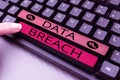 Conceptual caption Data Breach. Word for unauthorized release of confidential and secured details