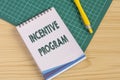 Conceptual caption Incentive Program. Business overview specific scheme used to promote certain action or behavior Royalty Free Stock Photo