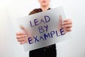 Conceptual caption Lead By Example. Conceptual photo Leadership Management Mentor Organization