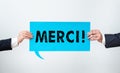 Conceptual caption Merci. Word Written on thank you in French what is said when someone helps you in France