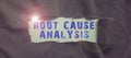 Hand writing sign Root Cause Analysis. Business idea Method of Problem Solving Identify Fault or Problem Royalty Free Stock Photo