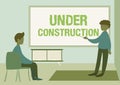 Conceptual caption Under Construction. Business concept building that is unfinished but actively being worked on Teacher Royalty Free Stock Photo
